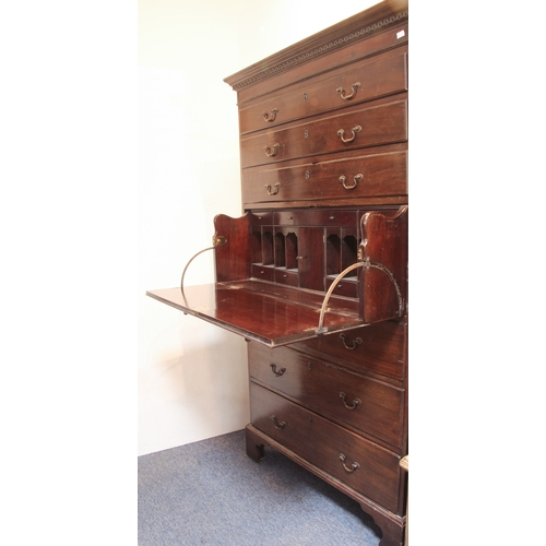 555 - A George III style mahogany secretaire chest-on-chest - 1920s, the dentil cornice over three graduat... 