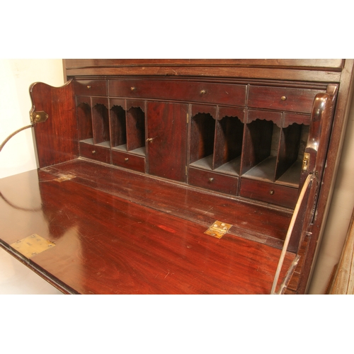 555 - A George III style mahogany secretaire chest-on-chest - 1920s, the dentil cornice over three graduat... 