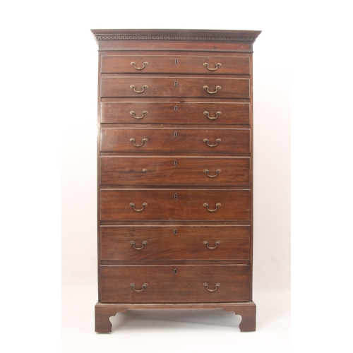 555 - A George III style mahogany secretaire chest-on-chest - 1920s, the dentil cornice over three graduat... 