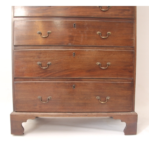 555 - A George III style mahogany secretaire chest-on-chest - 1920s, the dentil cornice over three graduat... 