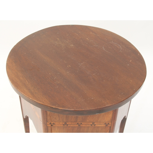 559 - A small Edwardian mahogany and parquetry occasional or drinks table - the (later) circular top over ... 