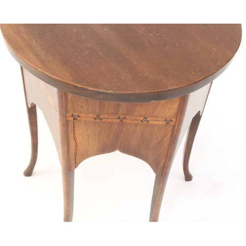 559 - A small Edwardian mahogany and parquetry occasional or drinks table - the (later) circular top over ... 