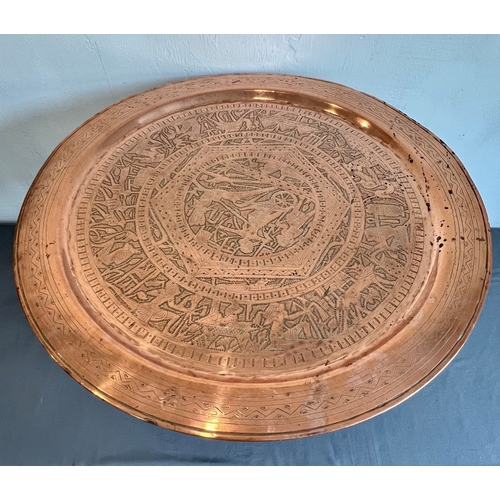 690 - Four North African and Indian brass trays - the largest in copper, Egyptian, first half 20th century... 