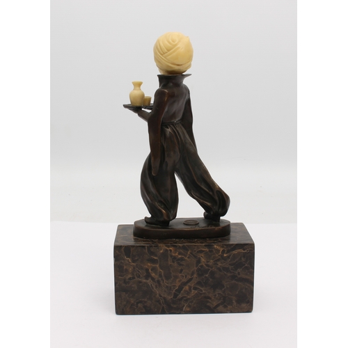 698 - after Ferdinand Preiss (1882-1943): a bronze figure, 'Oriental Waiter' - bronze and imitation ivory,... 