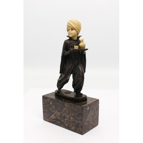 698 - after Ferdinand Preiss (1882-1943): a bronze figure, 'Oriental Waiter' - bronze and imitation ivory,... 