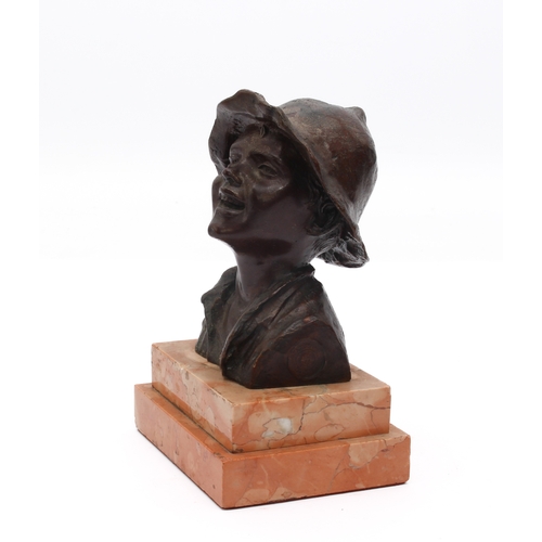 701 - Giovanni di Martino (187-1935): a bronze bust of a boy - with head slightly raised and with a laughi... 