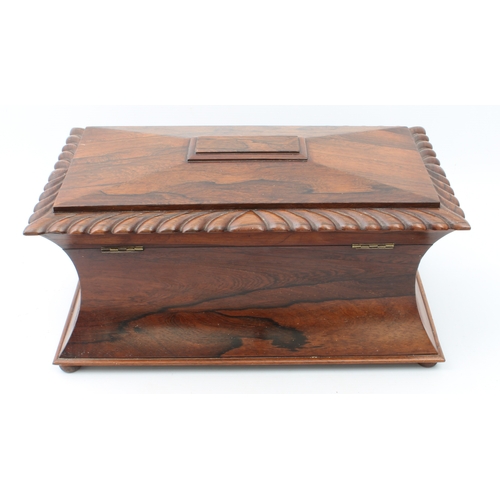 707 - An unusually large late-Regency rosewood sarcophagus tea caddy - with gadrooned border to the hinged... 