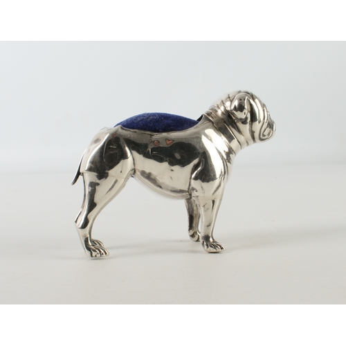 107 - An Edwardian silver pincushion by Adie and Lovekin in the form of a well-modelled standing bulldog w... 