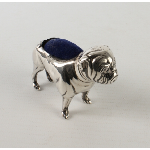 107 - An Edwardian silver pincushion by Adie and Lovekin in the form of a well-modelled standing bulldog w... 