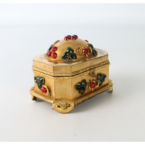 706 - An unusual gilt-metal jewellery box set with enamel cabochons, faded red silk interior and leather c... 