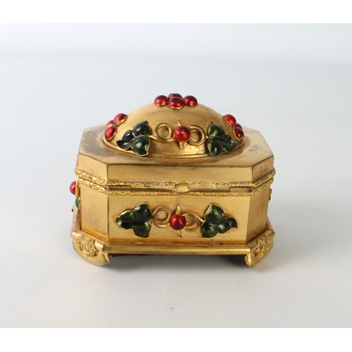 706 - An unusual gilt-metal jewellery box set with enamel cabochons, faded red silk interior and leather c... 