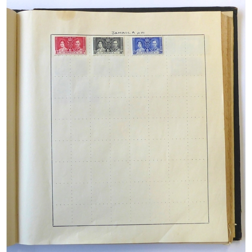 759 - A 'Triumph Stamp Album of the World' - a good collection of GB and world stamps, mostly Victoria to ... 