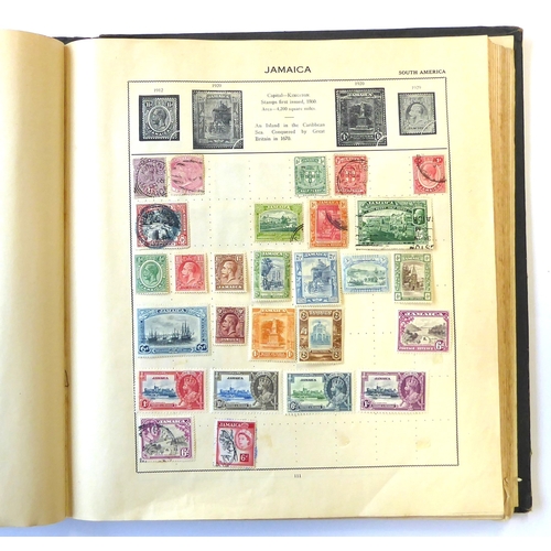 759 - A 'Triumph Stamp Album of the World' - a good collection of GB and world stamps, mostly Victoria to ... 