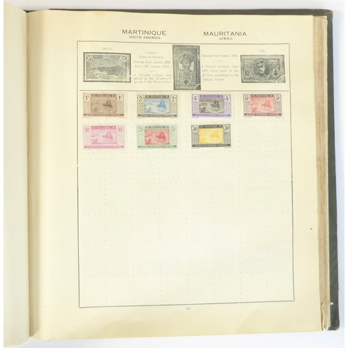 759 - A 'Triumph Stamp Album of the World' - a good collection of GB and world stamps, mostly Victoria to ... 