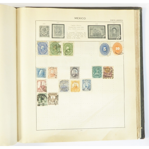 759 - A 'Triumph Stamp Album of the World' - a good collection of GB and world stamps, mostly Victoria to ... 