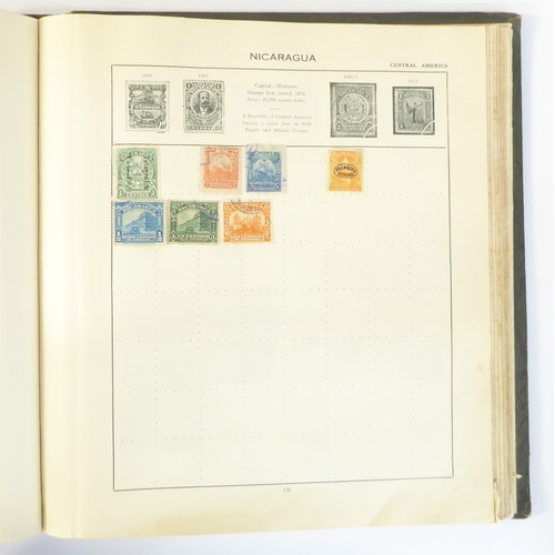 759 - A 'Triumph Stamp Album of the World' - a good collection of GB and world stamps, mostly Victoria to ... 