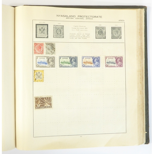 759 - A 'Triumph Stamp Album of the World' - a good collection of GB and world stamps, mostly Victoria to ... 