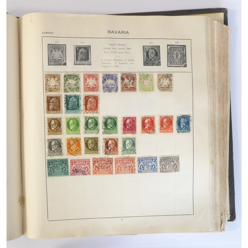 759 - A 'Triumph Stamp Album of the World' - a good collection of GB and world stamps, mostly Victoria to ... 