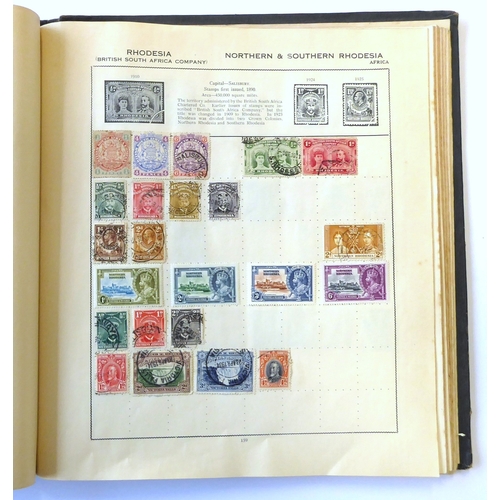 759 - A 'Triumph Stamp Album of the World' - a good collection of GB and world stamps, mostly Victoria to ... 