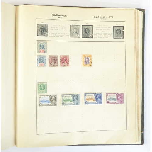 759 - A 'Triumph Stamp Album of the World' - a good collection of GB and world stamps, mostly Victoria to ... 