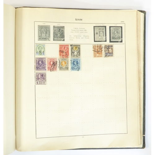 759 - A 'Triumph Stamp Album of the World' - a good collection of GB and world stamps, mostly Victoria to ... 