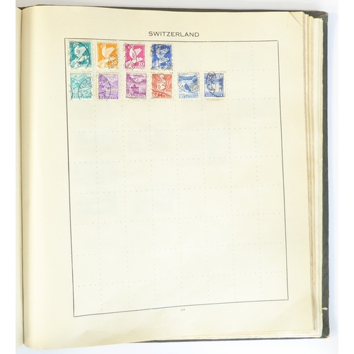 759 - A 'Triumph Stamp Album of the World' - a good collection of GB and world stamps, mostly Victoria to ... 