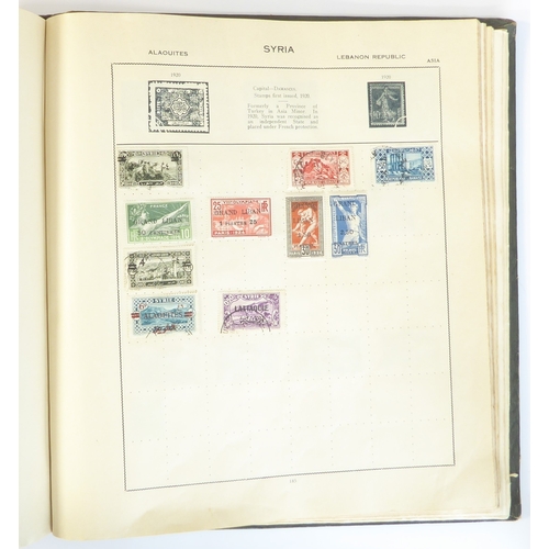 759 - A 'Triumph Stamp Album of the World' - a good collection of GB and world stamps, mostly Victoria to ... 