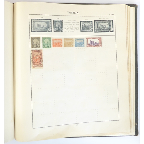 759 - A 'Triumph Stamp Album of the World' - a good collection of GB and world stamps, mostly Victoria to ... 