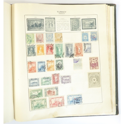 759 - A 'Triumph Stamp Album of the World' - a good collection of GB and world stamps, mostly Victoria to ... 