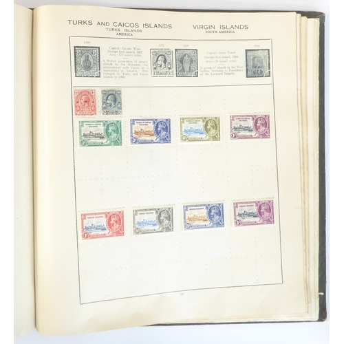 759 - A 'Triumph Stamp Album of the World' - a good collection of GB and world stamps, mostly Victoria to ... 