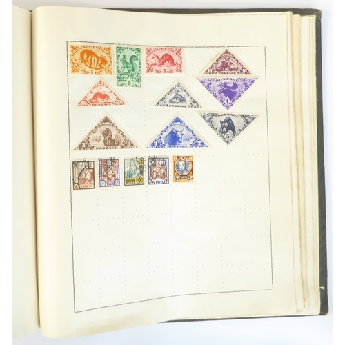 759 - A 'Triumph Stamp Album of the World' - a good collection of GB and world stamps, mostly Victoria to ... 