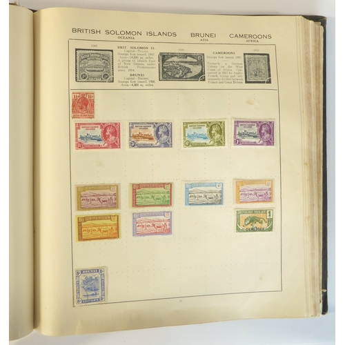 759 - A 'Triumph Stamp Album of the World' - a good collection of GB and world stamps, mostly Victoria to ... 