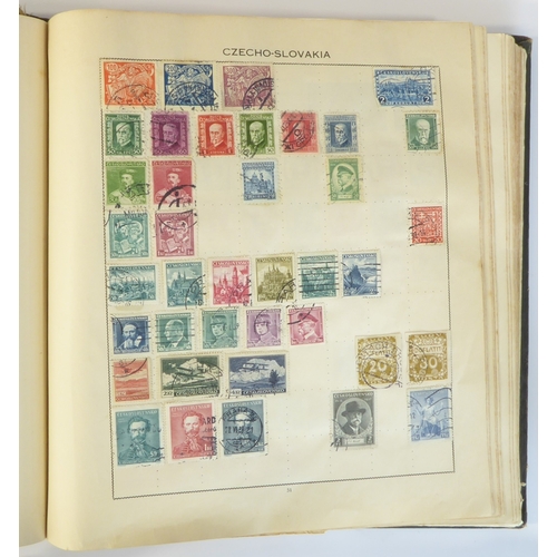 759 - A 'Triumph Stamp Album of the World' - a good collection of GB and world stamps, mostly Victoria to ... 