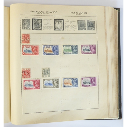 759 - A 'Triumph Stamp Album of the World' - a good collection of GB and world stamps, mostly Victoria to ... 