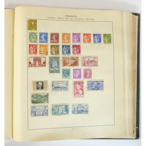 759 - A 'Triumph Stamp Album of the World' - a good collection of GB and world stamps, mostly Victoria to ... 