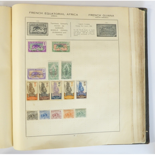 759 - A 'Triumph Stamp Album of the World' - a good collection of GB and world stamps, mostly Victoria to ... 