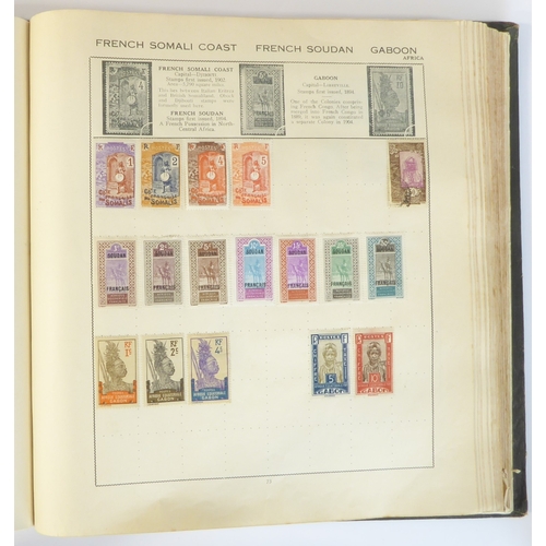 759 - A 'Triumph Stamp Album of the World' - a good collection of GB and world stamps, mostly Victoria to ... 