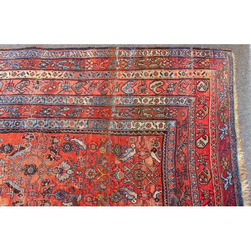 608 - An antique Bijar North-West Persian carpet - c.1870, the central blue large lozenge on a red ground ... 