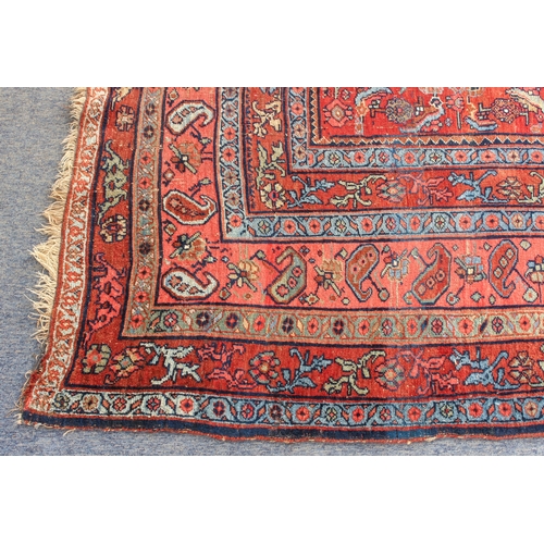 608 - An antique Bijar North-West Persian carpet - c.1870, the central blue large lozenge on a red ground ... 