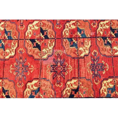 610 - A good Tekke Turkmen carpet - mid-19th century, with five vertical rows of thirteen gols, the main b... 