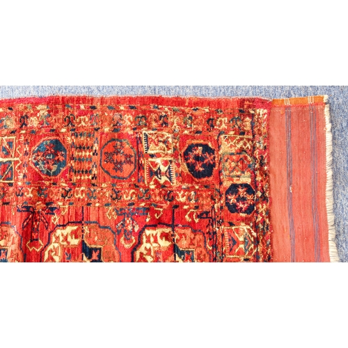 610 - A good Tekke Turkmen carpet - mid-19th century, with five vertical rows of thirteen gols, the main b... 