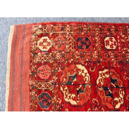 610 - A good Tekke Turkmen carpet - mid-19th century, with five vertical rows of thirteen gols, the main b... 