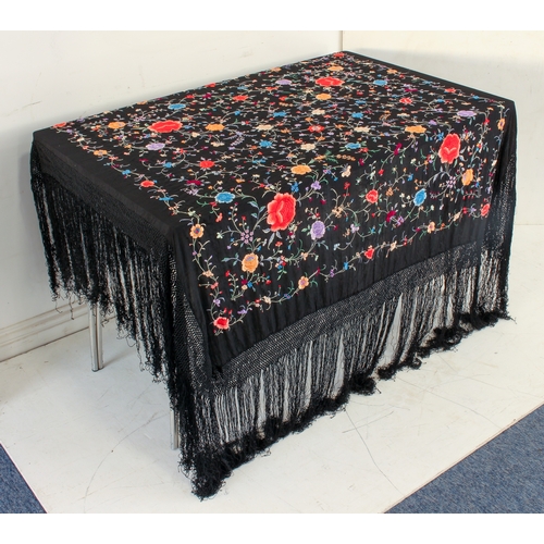 650 - An early 20th century Chinese silk embroidered piano shawl - richly decorated with flowers and folia... 