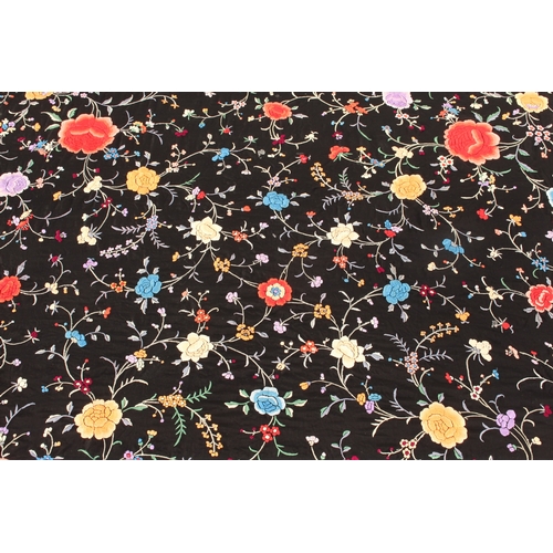 650 - An early 20th century Chinese silk embroidered piano shawl - richly decorated with flowers and folia... 