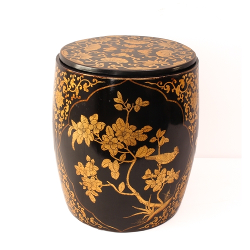 434 - A Chinese black lacquered and gilt rice barrel occasional table - 20th century, painted with three s... 