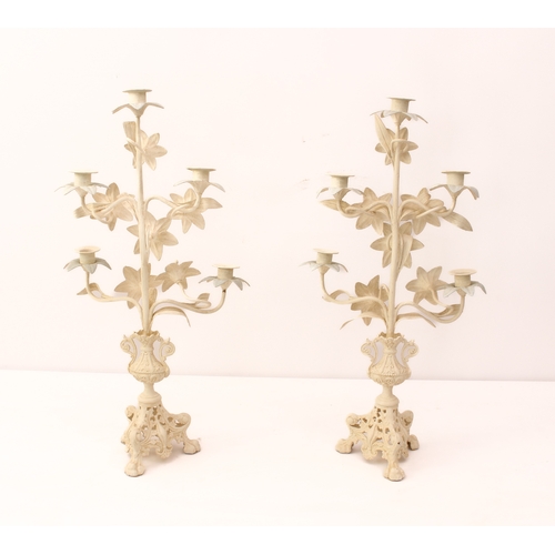 669 - A pair of French ivory and pale blue painted cast metal five light candelabra - mid-20th century in ... 