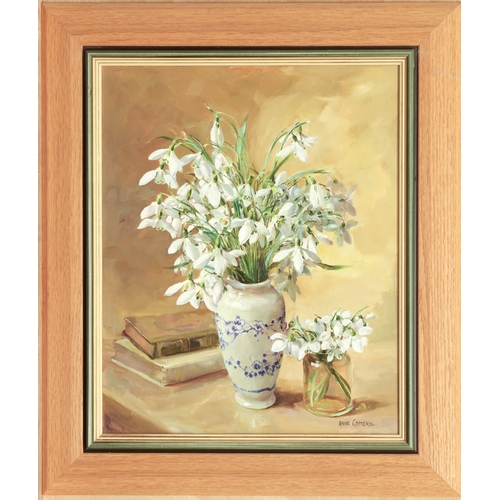 326 - Anne Cotterill (British, 1933-2010)
 Snowdrops in a Chinese vase
 oil on board, signed
 14¾ x 12in