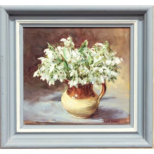 354 - Anne Cotterill (British, 1933-2010)
 Snowdrops in a stoneware jug
 oil on board, signed lower right
... 