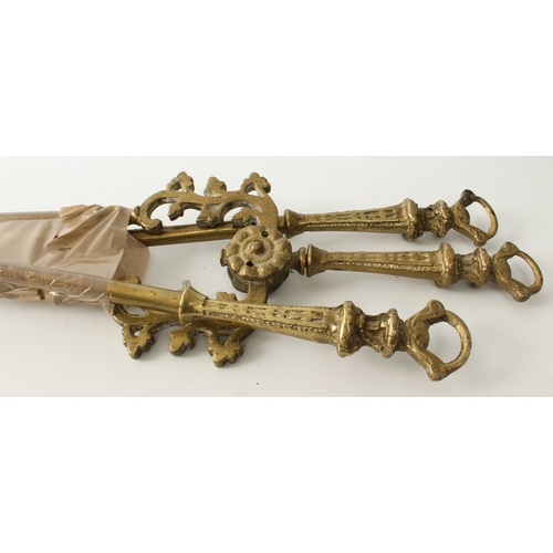 676 - A group of eight brass, polished steel and wrought iron fire irons - including a set of 19th century... 