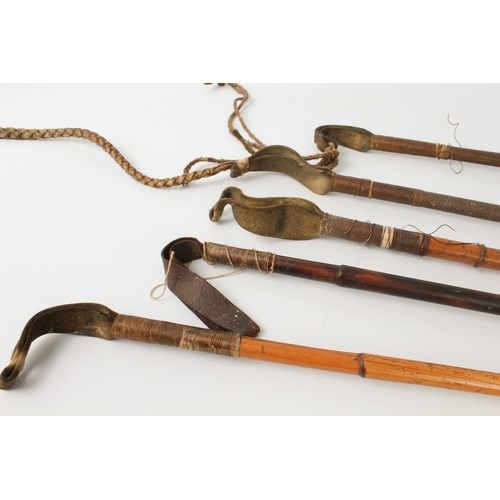 747 - A collection of vintage riding crops and whips - early to mid-20th century, some with antler, carved... 